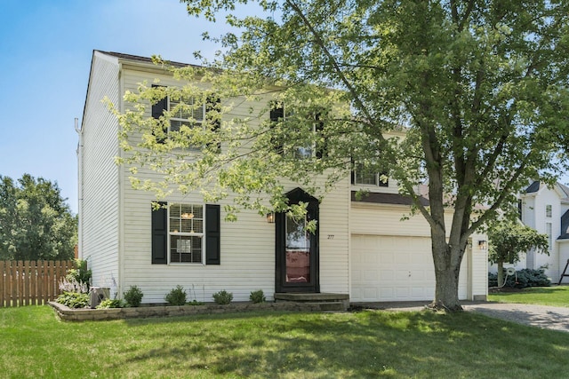 277 Plum Run Ct, Commercial Point, OH 43116 - view of property hidden behind natural elements featuring an attached garage