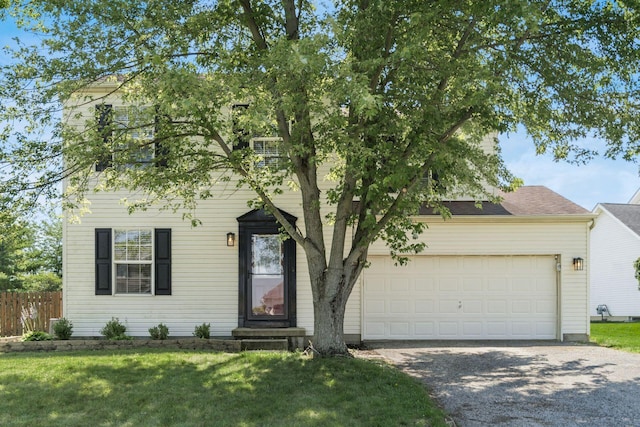 277 Plum Run Ct, Commercial Point, OH 43116 - view of property hidden behind natural elements with driveway and a garage