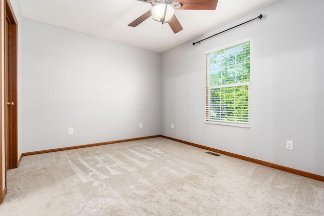 277 Plum Run Ct, Commercial Point, OH 43116 - empty room featuring light carpet and a ceiling fan