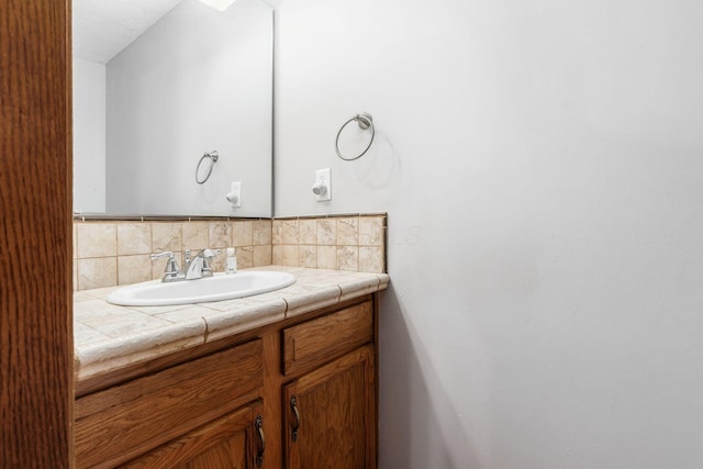 277 Plum Run Ct, Commercial Point, OH 43116 - bathroom with vanity and backsplash