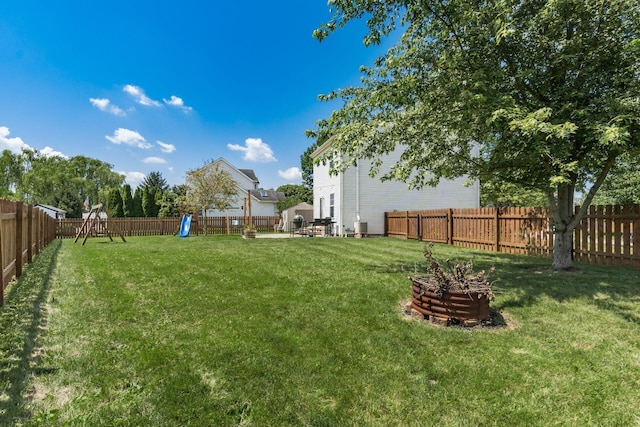 277 Plum Run Ct, Commercial Point, OH 43116 - fenced backyard with a playground