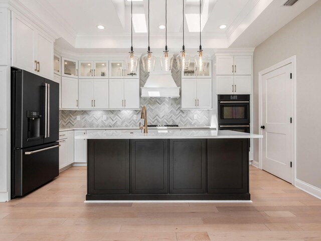 3311 Polden Hill Dr Unit 24, New Albany, OH 43054 - kitchen featuring black appliances, custom range hood, white cabinets, crown molding, and recessed lighting