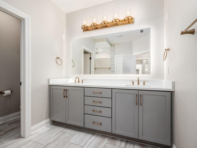 3311 Polden Hill Dr Unit 24, New Albany, OH 43054 - bathroom with double vanity and baseboards