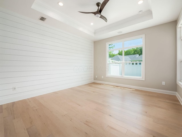3311 Polden Hill Dr Unit 24, New Albany, OH 43054 - unfurnished room with a raised ceiling, crown molding, light wood finished floors, ceiling fan, and recessed lighting