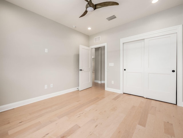3311 Polden Hill Dr Unit 24, New Albany, OH 43054 - unfurnished bedroom featuring recessed lighting, light wood-style flooring, a closet, and a ceiling fan