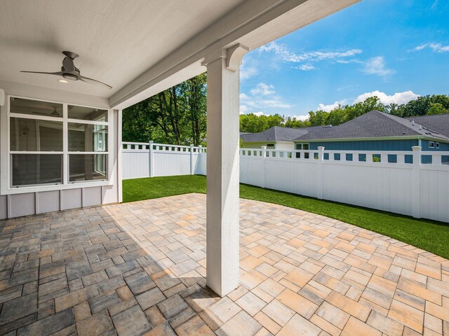 3311 Polden Hill Dr Unit 24, New Albany, OH 43054 - fenced backyard featuring a ceiling fan and a patio area