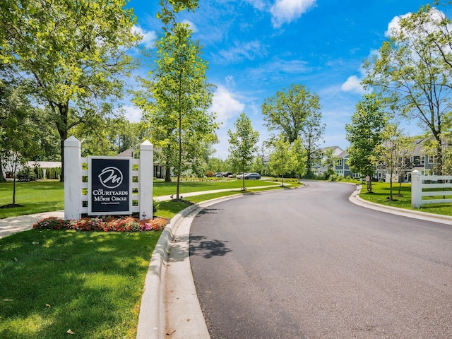 3311 Polden Hill Dr Unit 24, New Albany, OH 43054 - view of asphalt street featuring curbs