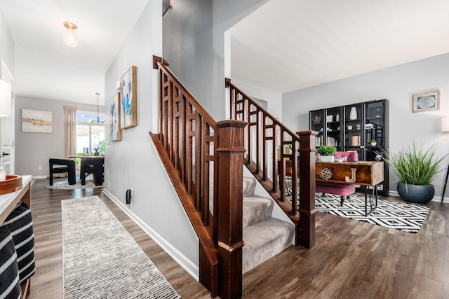 7036 Cannon Dr, Canal Winchester, OH 43110 - stairway featuring wood finished floors and baseboards