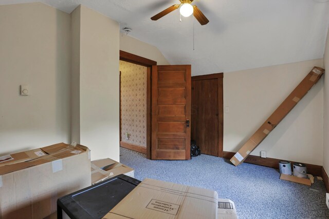 16703 Watkins Rd, Haydenville, OH 43127 - carpeted living area with ceiling fan and vaulted ceiling