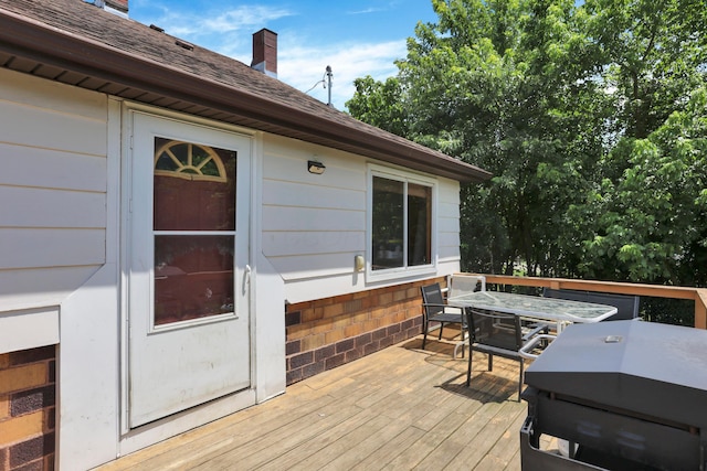 16703 Watkins Rd, Haydenville, OH 43127 - deck with outdoor dining space and a grill