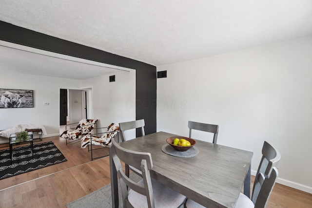 1366 Brown Rd, Columbus, OH 43223 - dining space featuring wood finished floors and baseboards