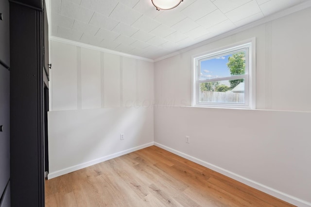 1366 Brown Rd, Columbus, OH 43223 - unfurnished room featuring crown molding and light wood finished floors