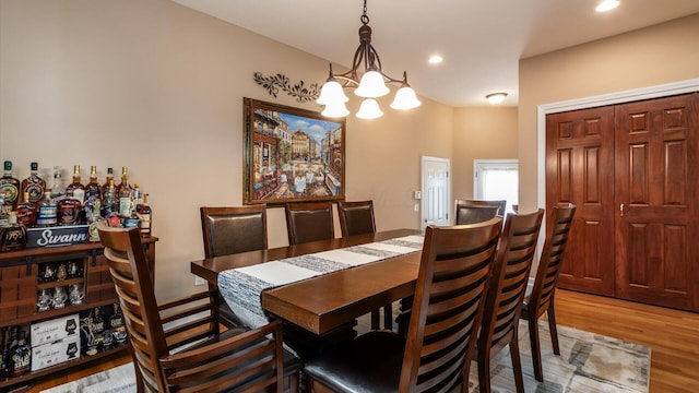 8933 Winding Creek Way, Pickerington, OH 43147 - dining room featuring a chandelier, wood finished floors, and recessed lighting