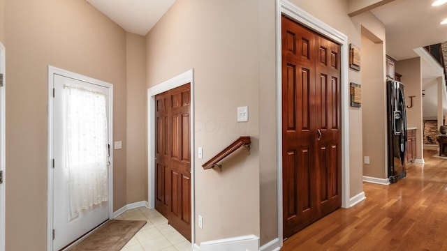 8933 Winding Creek Way, Pickerington, OH 43147 - foyer featuring a high ceiling and light wood-style flooring