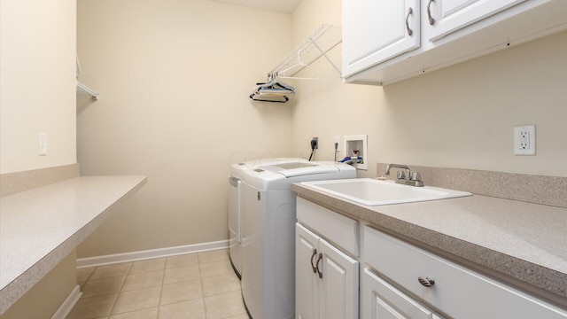 8933 Winding Creek Way, Pickerington, OH 43147 - laundry room with washer and clothes dryer, cabinet space, and light tile patterned floors