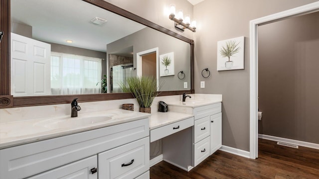 8933 Winding Creek Way, Pickerington, OH 43147 - bathroom with vanity, wood finished floors, and a shower stall