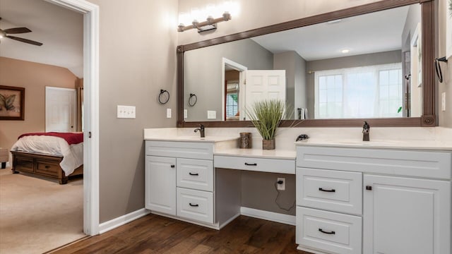8933 Winding Creek Way, Pickerington, OH 43147 - ensuite bathroom featuring double vanity, ceiling fan, and wood finished floors