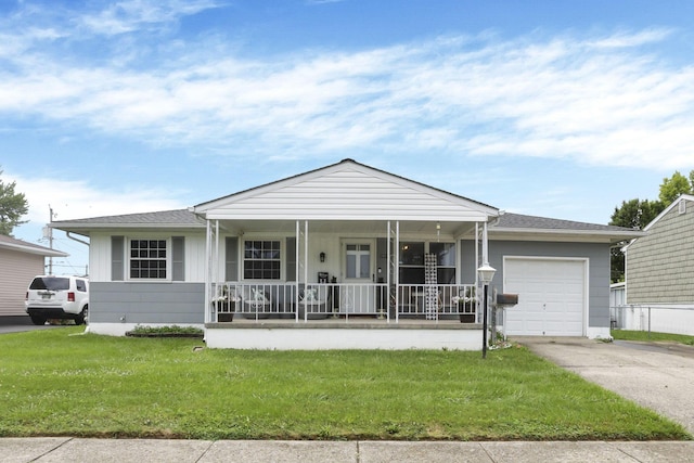 3905 Frazier Rd E, Columbus, OH 43207 - ranch-style home featuring covered porch, a garage, a front yard, and driveway