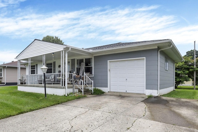 3905 Frazier Rd E, Columbus, OH 43207 - ranch-style home featuring covered porch, driveway, and a garage