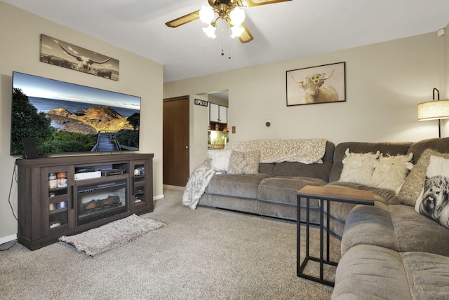 3905 Frazier Rd E, Columbus, OH 43207 - living area with ceiling fan and carpet floors