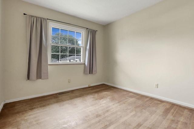 3905 Frazier Rd E, Columbus, OH 43207 - unfurnished room featuring baseboards and wood finished floors