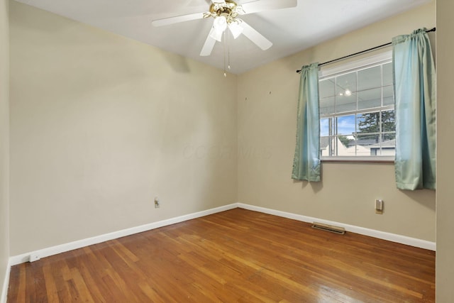 3905 Frazier Rd E, Columbus, OH 43207 - unfurnished room with wood finished floors and ceiling fan