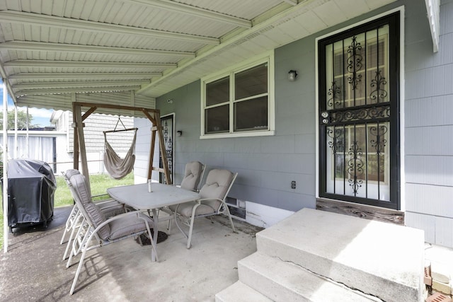 3905 Frazier Rd E, Columbus, OH 43207 - view of patio featuring area for grilling and outdoor dining area