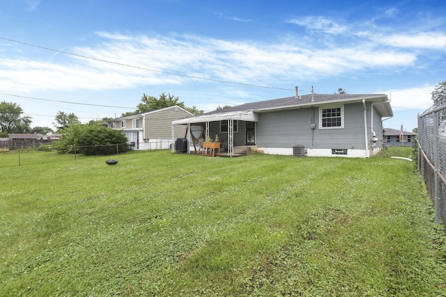 3905 Frazier Rd E, Columbus, OH 43207 - rear view of house with a fenced backyard and entry steps