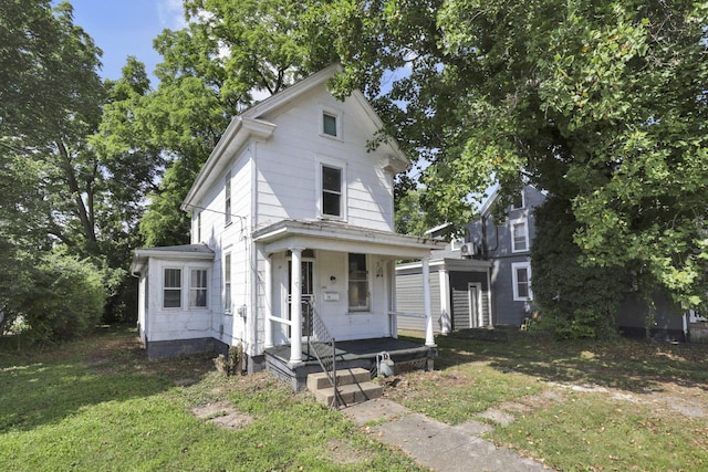 141 W Waterloo St, Canal Winchester, OH 43110 - view of front facade featuring a front lawn and a porch