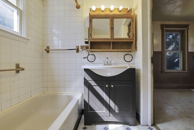 141 W Waterloo St, Canal Winchester, OH 43110 - full bath featuring vanity, a tub to relax in, and tile walls