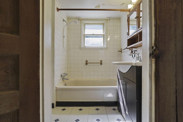 141 W Waterloo St, Canal Winchester, OH 43110 - bathroom with tile patterned flooring, vanity, and shower / washtub combination