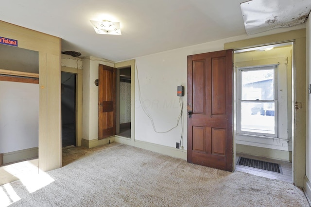 141 W Waterloo St, Canal Winchester, OH 43110 - unfurnished bedroom featuring carpet floors and multiple closets