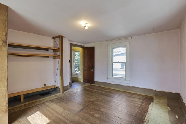 141 W Waterloo St, Canal Winchester, OH 43110 - unfurnished bedroom featuring hardwood / wood-style flooring and multiple windows