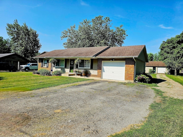 4999 Dickey Rd NE, Bloomingburg, OH 43106 - ranch-style home with brick siding, a garage, a front lawn, and driveway