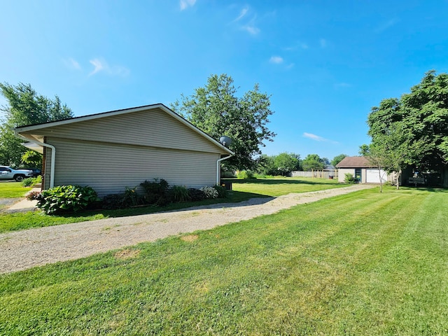 4999 Dickey Rd NE, Bloomingburg, OH 43106 - view of green lawn with dirt driveway