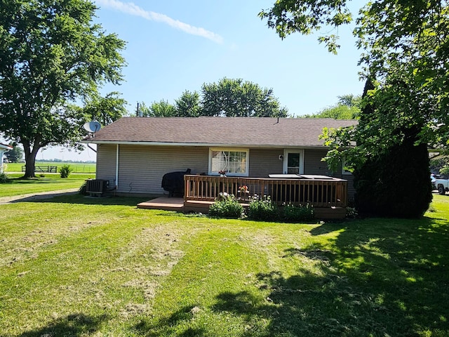 4999 Dickey Rd NE, Bloomingburg, OH 43106 - rear view of property featuring a deck and a yard
