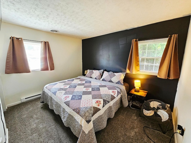 4999 Dickey Rd NE, Bloomingburg, OH 43106 - bedroom with carpet, a baseboard radiator, and a textured ceiling