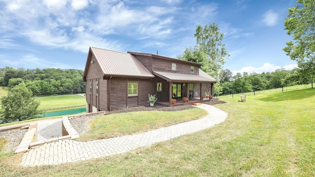 19448 Cr-80, Warsaw, OH 43844 - rear view of property with a lawn, covered porch, a metal roof, and log veneer siding