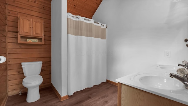 19448 Cr-80, Warsaw, OH 43844 - full bathroom with wood finished floors, double vanity, lofted ceiling, and a shower with shower curtain