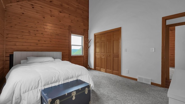 19448 Cr-80, Warsaw, OH 43844 - carpeted bedroom with wooden walls and a high ceiling