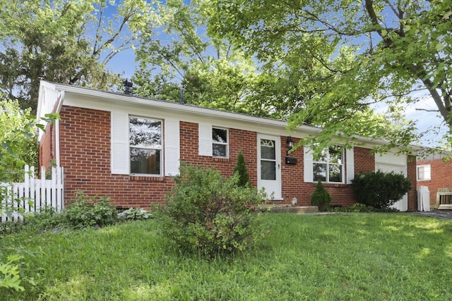 1850 Ormond Ave, Columbus, OH 43224 - view of front of home featuring brick siding and an attached garage