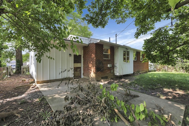 1850 Ormond Ave, Columbus, OH 43224 - view of front of home with brick siding and board and batten siding