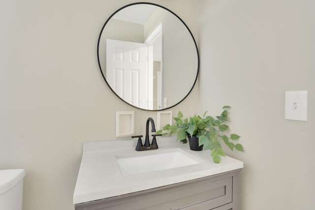 1850 Ormond Ave, Columbus, OH 43224 - half bath featuring vanity and toilet