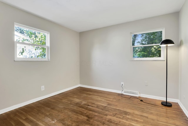 1850 Ormond Ave, Columbus, OH 43224 - spare room featuring baseboards and wood finished floors