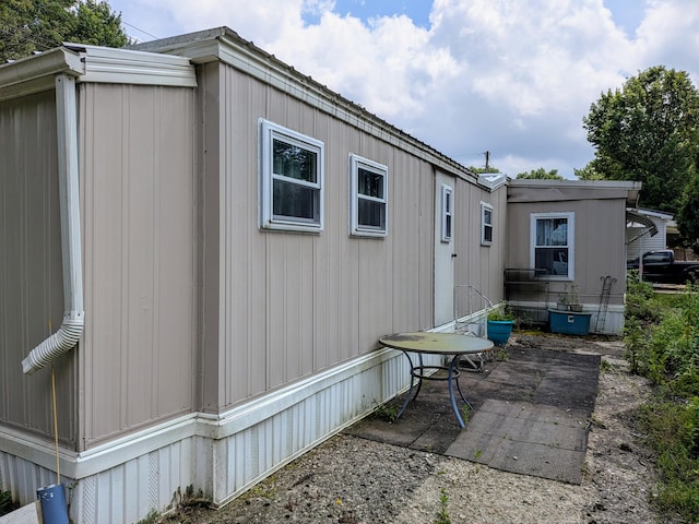 8927 Columbus Rd Lot 44, Mount Vernon, OH 43050 - view of property exterior featuring a patio area