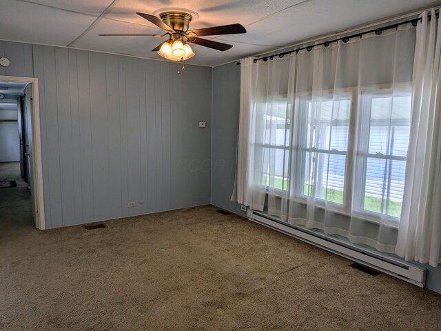 8927 Columbus Rd Lot 44, Mount Vernon, OH 43050 - carpeted empty room featuring a baseboard radiator and a ceiling fan