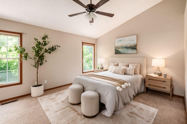 2378 Yagger Bay Dr, Hilliard, OH 43026 - carpeted bedroom featuring multiple windows, vaulted ceiling, and a ceiling fan