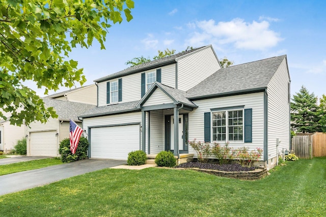 2378 Yagger Bay Dr, Hilliard, OH 43026 - traditional-style home with driveway, roof with shingles, and an attached garage