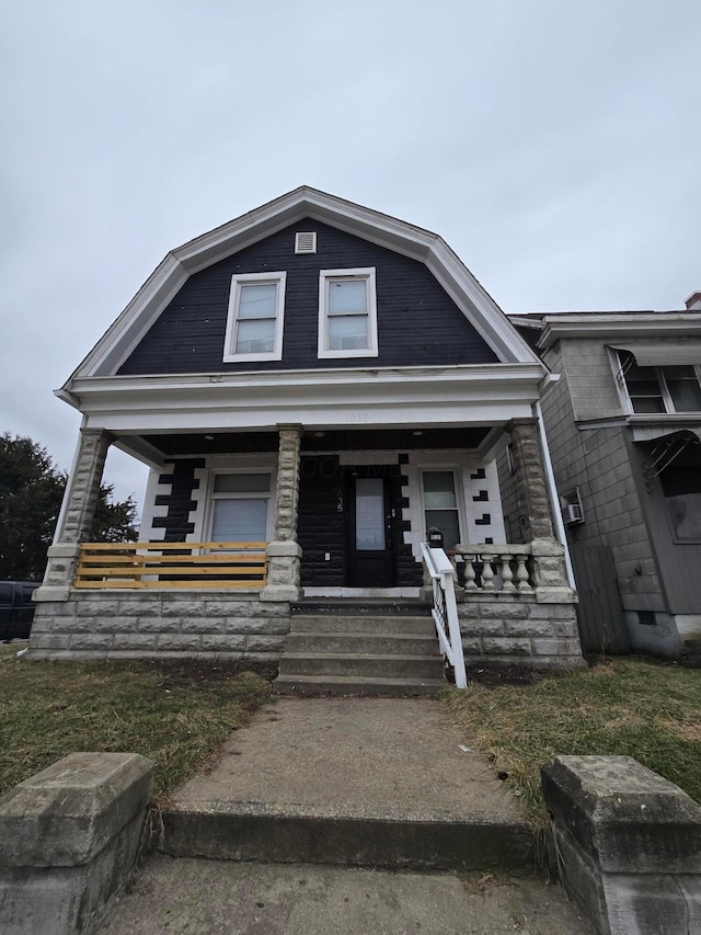 1035 Sullivant Ave, Columbus, OH 43223 - view of front of property featuring a porch and a gambrel roof