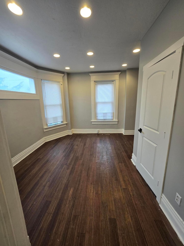 1035 Sullivant Ave, Columbus, OH 43223 - spare room featuring plenty of natural light, dark wood-type flooring, and recessed lighting